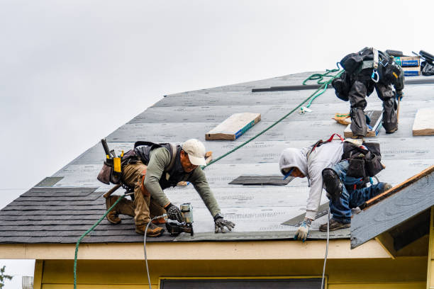 Professional Roofing technician working in Ninnekah, OK